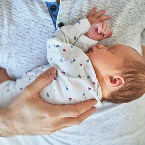 Man holding baby